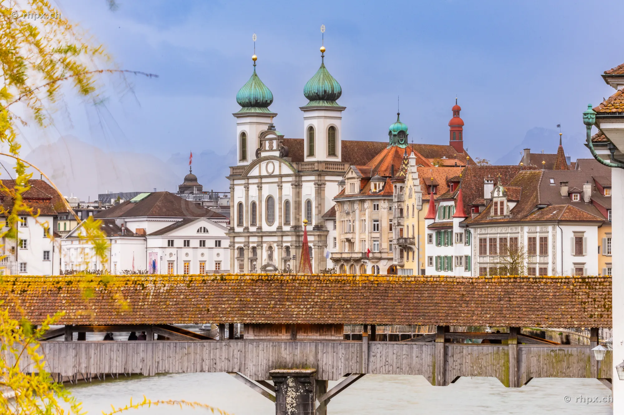 View of the Jesuit Church and the Chapel Bridge in Lucerne