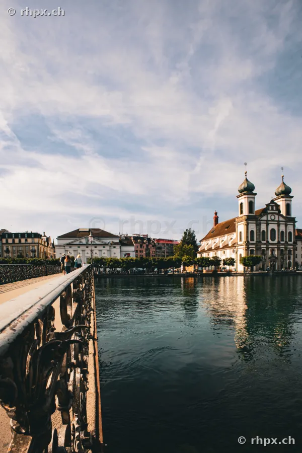 View from the Rathaussteg bridge towards the Jesuit Church in Lucerne by the Reuss river