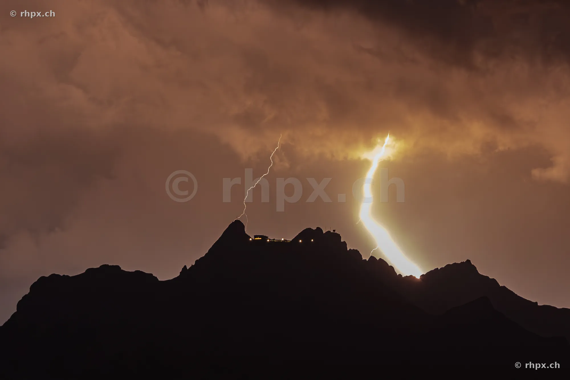 Lightning storm over the summit of Mount Pilatus in Central Switzerland at night.