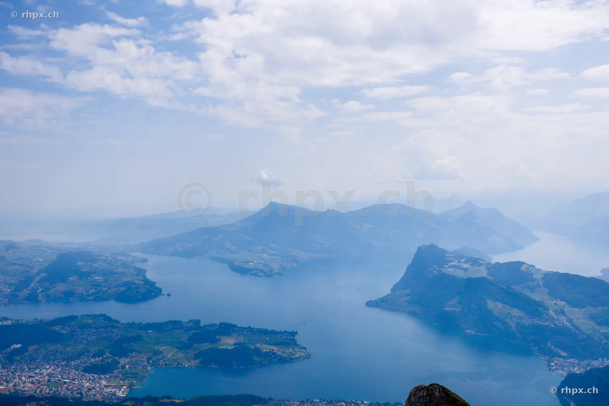 Wide-angle view from Mount Pilatus over Lake Lucerne with the Burgenstock and mountains of Central Switzerland