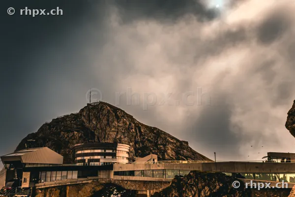 Hotel Bellevue and mountain station on Mount Pilatus under a cloudy sky