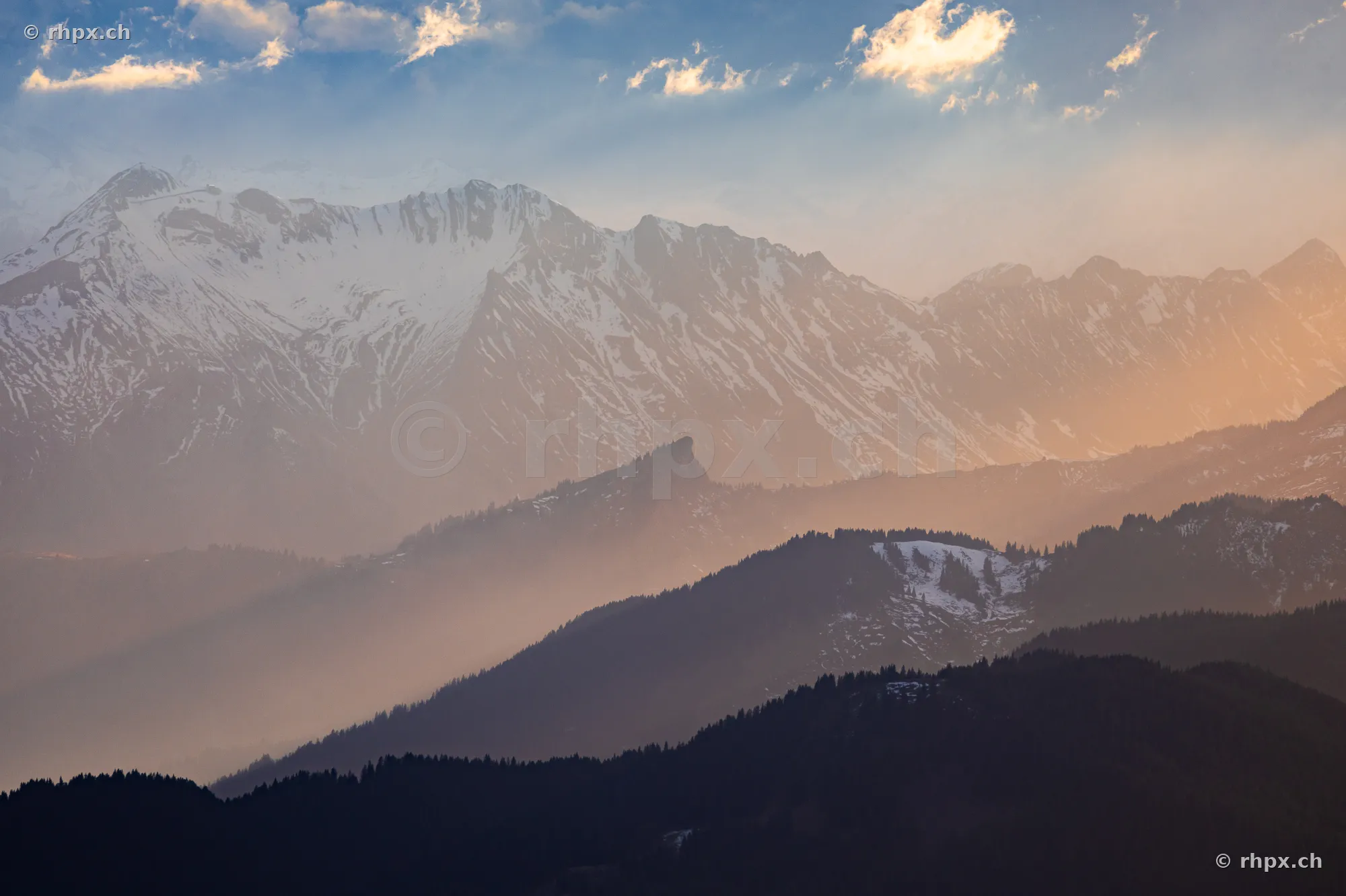 View of the snow-covered Pilatus mountain under low evening sun