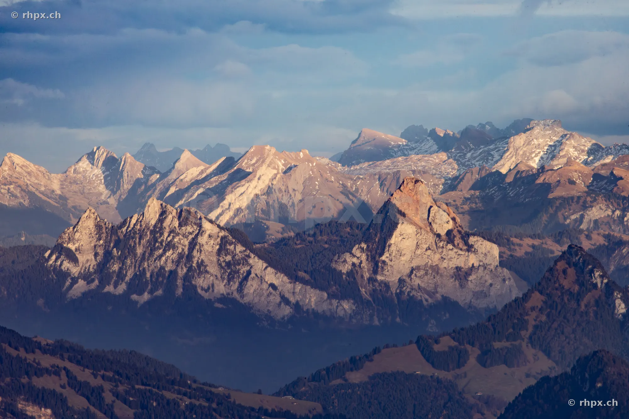 Panoramic view of the Pilatus massif peaks in low sunlight