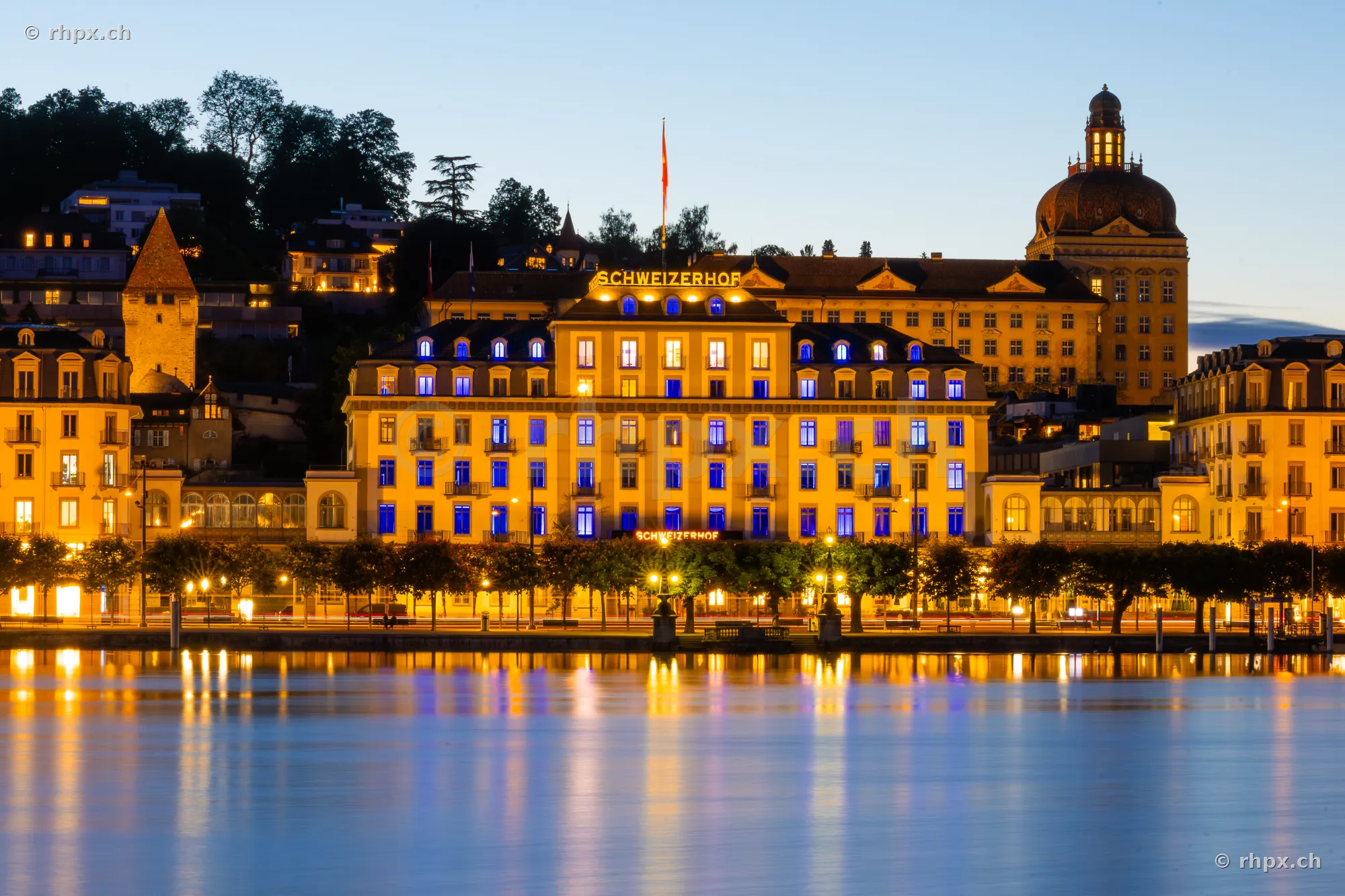 Hotel Schweizerhof on the Lucerne lakeshore at twilight
