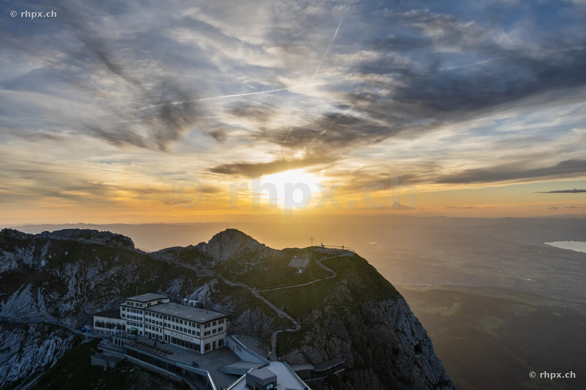 Hotel Bellevue and summit path on Mount Pilatus in evening light