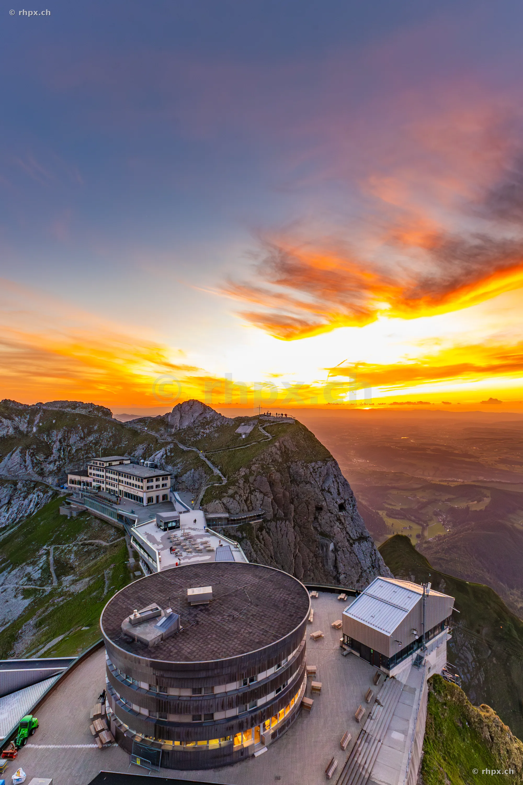 Aerial view of the buildings on Pilatus Kulm at sunset