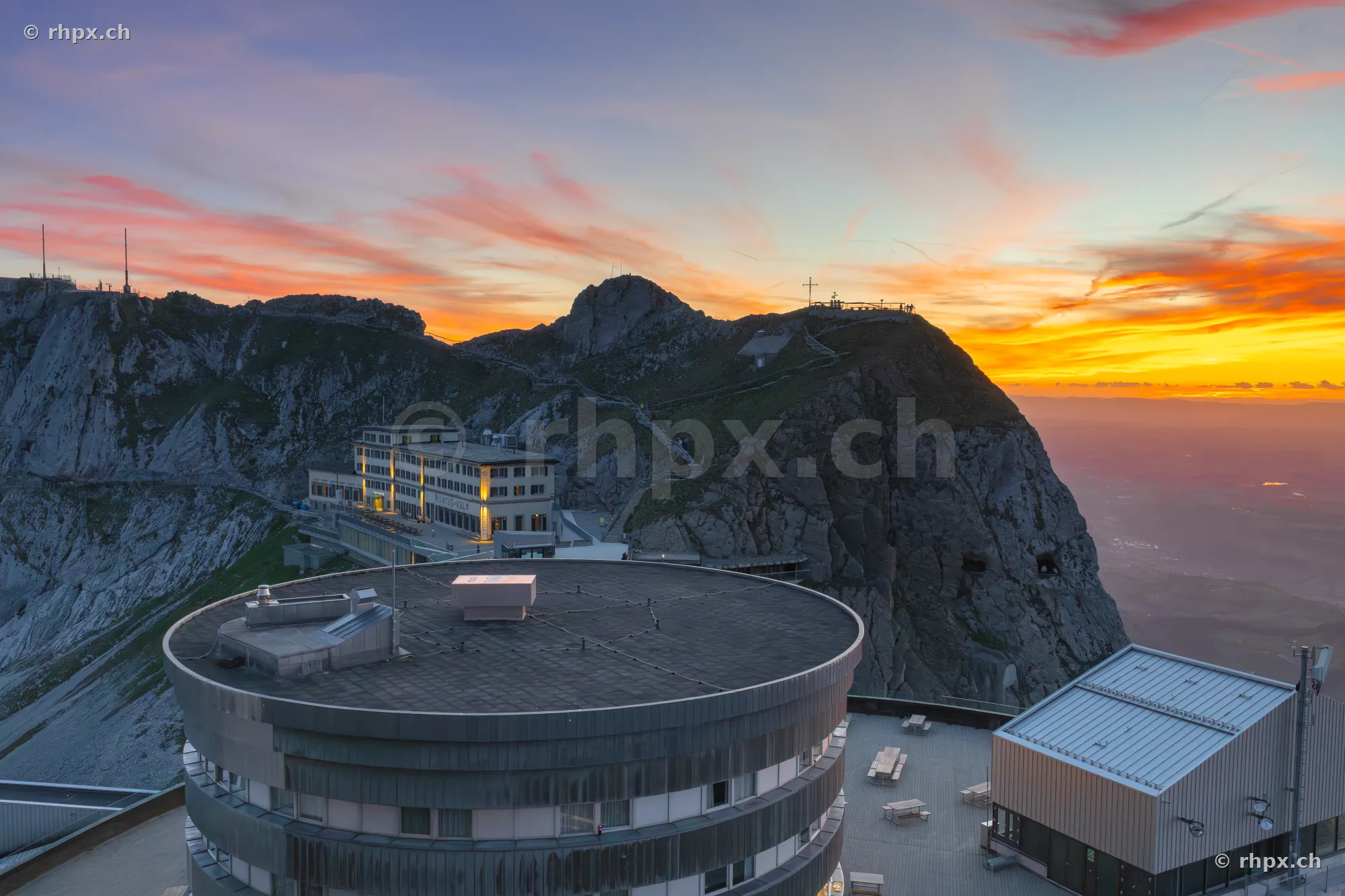 View of the Pilatus-Kulm hotel and the Pilatus summit at sunset