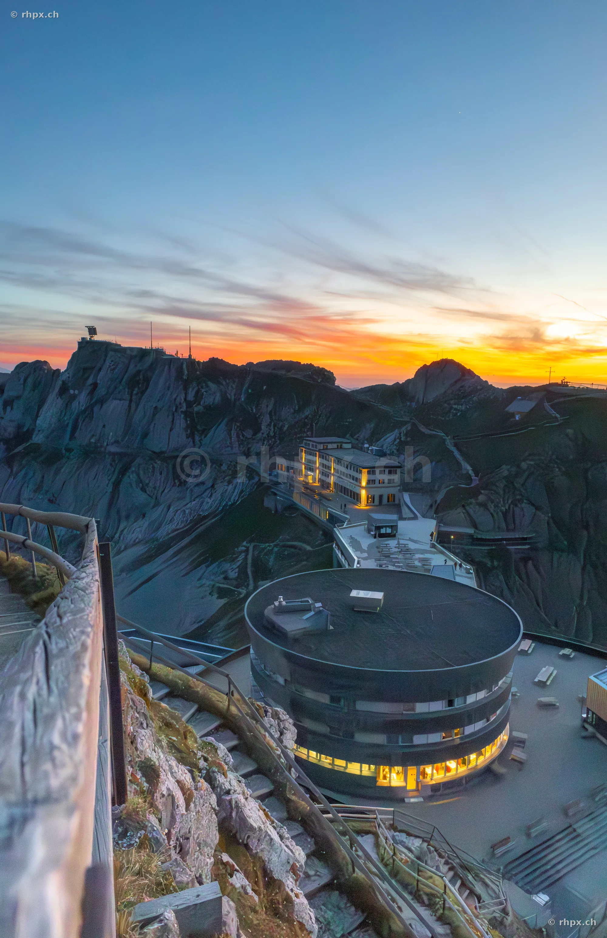 View of Hotel Pilatus-Kulm and the Pilatus summit at sunset