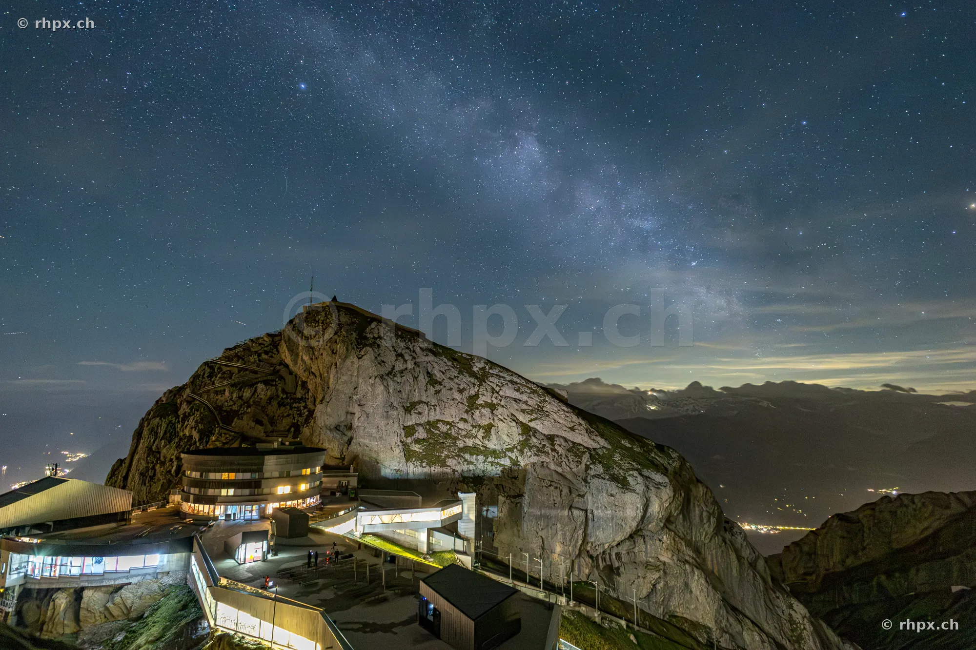 Night shot of the illuminated Pilatus summit with the Milky Way in the starry sky