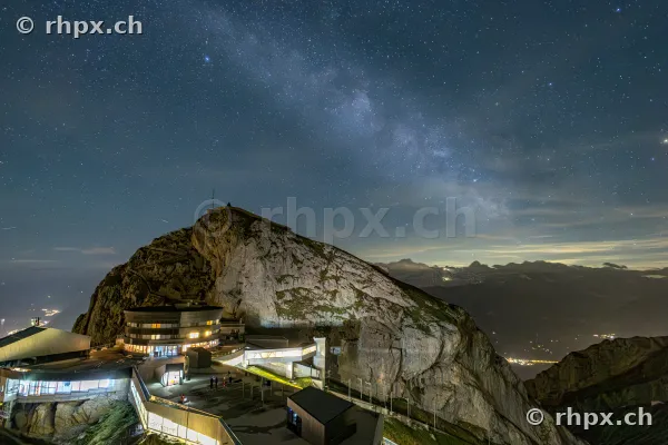 Night shot of the illuminated Pilatus summit with the Milky Way in the starry sky