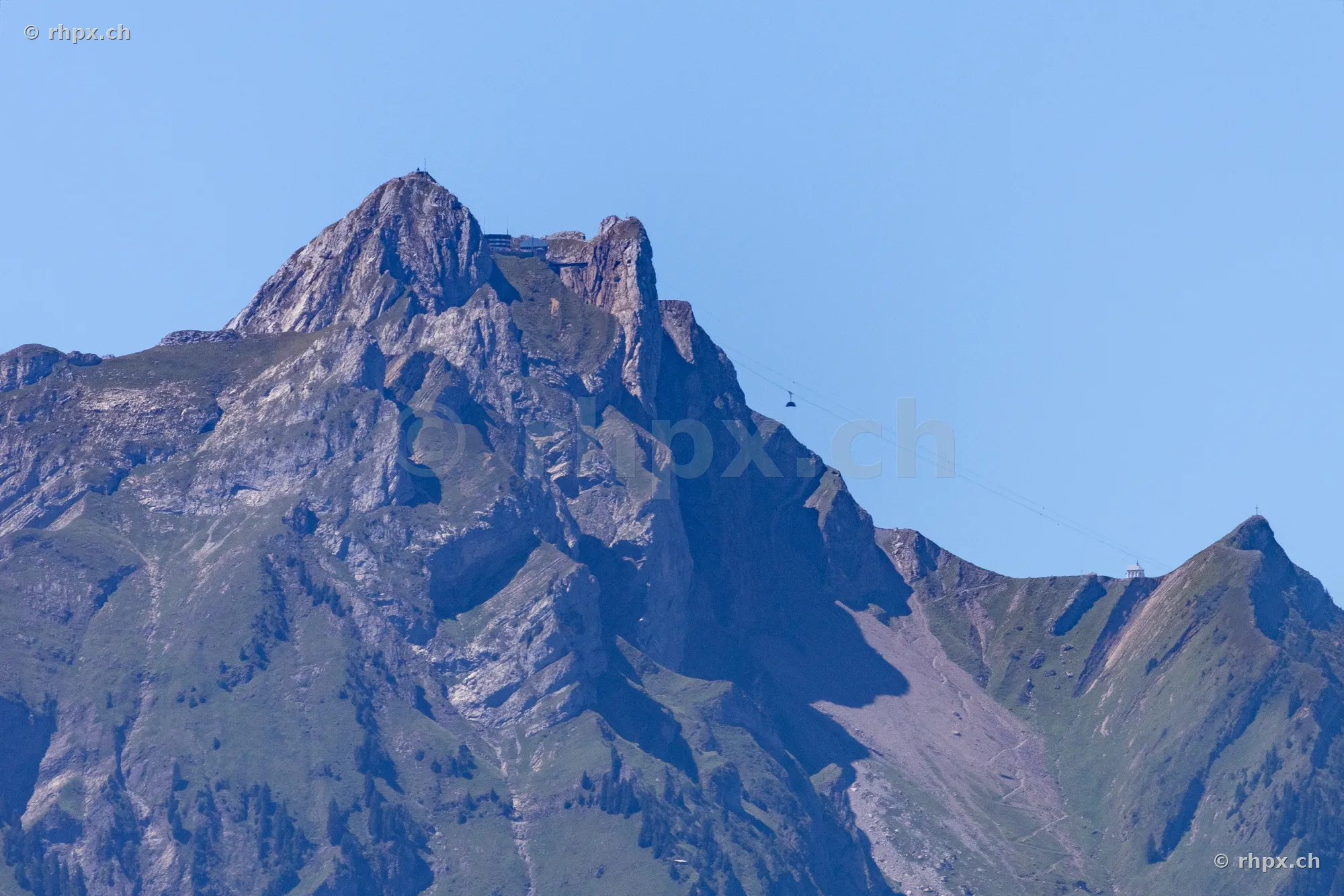 View of the summit of Mount Pilatus under a blue sky