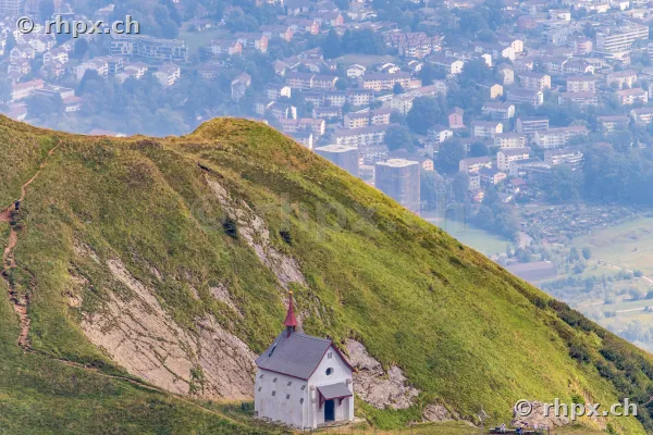 The chapel on Mount Pilatus with a view of the city of Lucerne