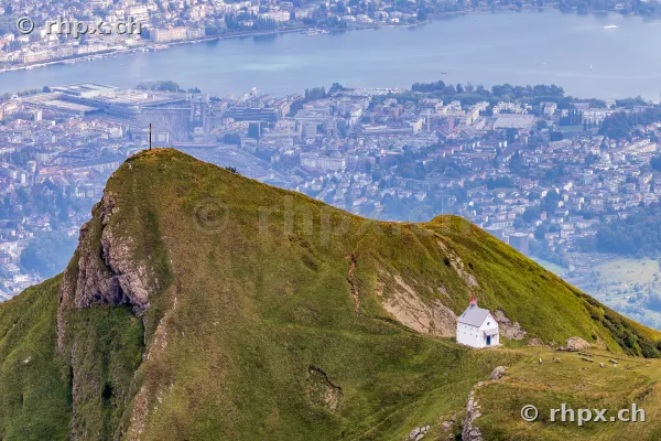 The mountain chapel on Mount Pilatus near Lucerne, with Lake Lucerne and the city of Lucerne in the background.