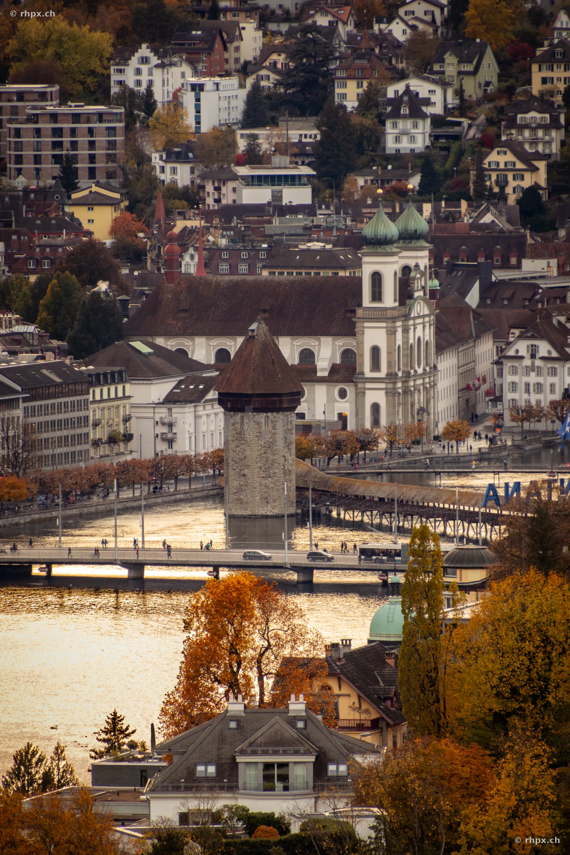Aerial view of the Chapel Bridge, Jesuit Church and Reuss river in Lucerne in autumn