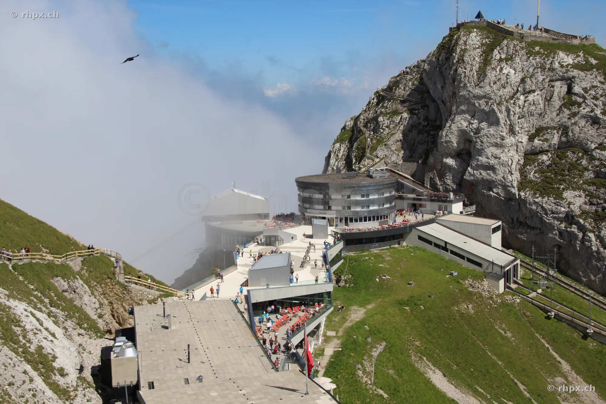 Pilatus Kulm Hotel and summit area with approaching fog