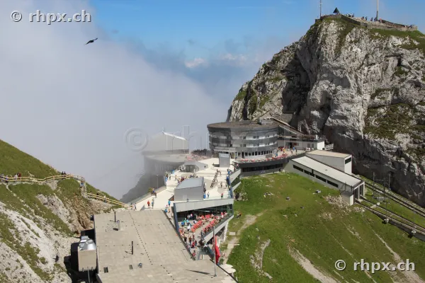 Pilatus Kulm Hotel and summit area with approaching fog