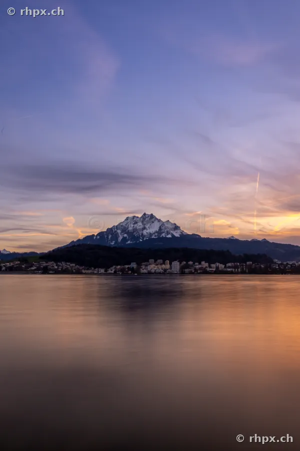 View across Lake Lucerne towards Mount Pilatus at dusk