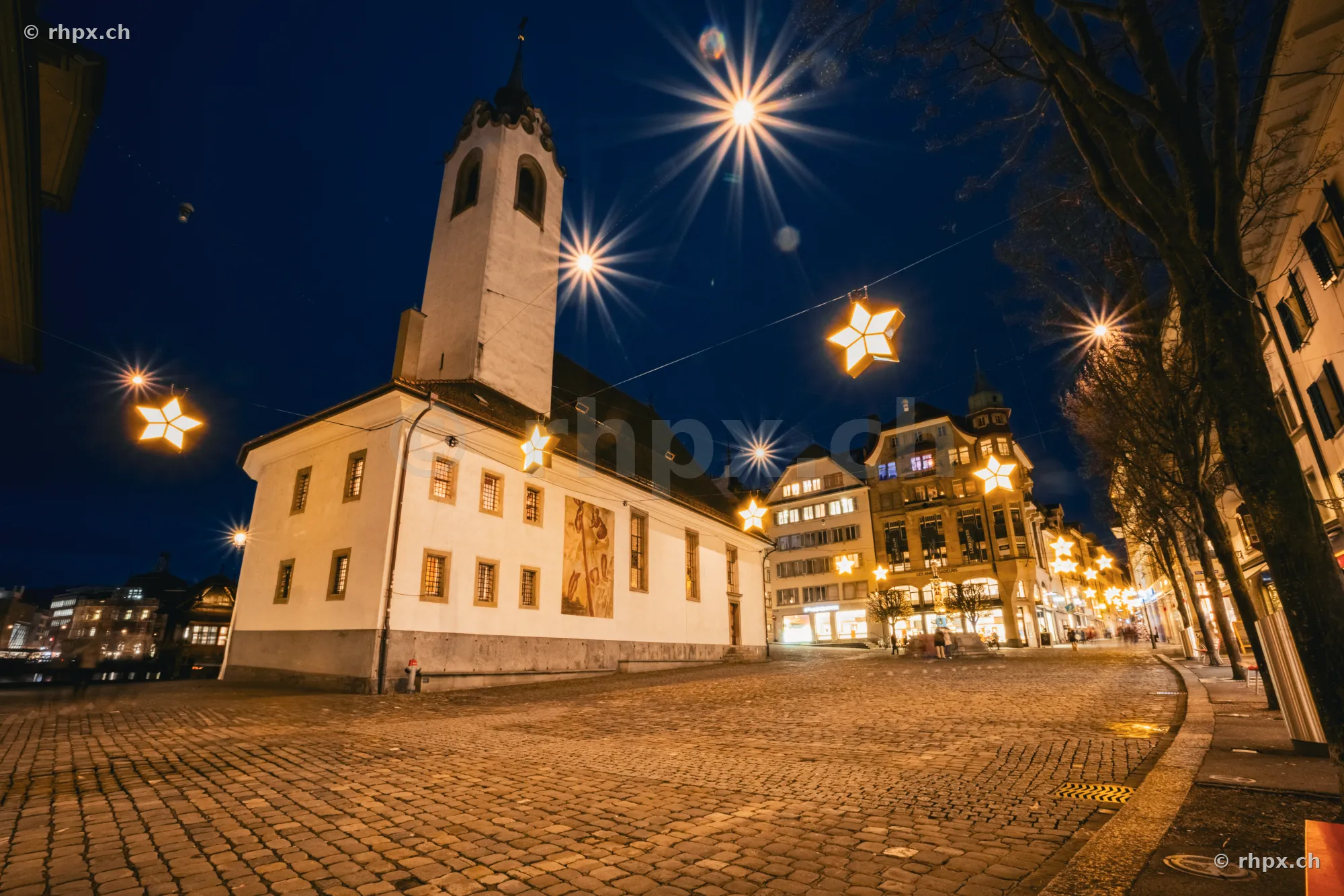 St. Peter's Chapel at night with Christmas lights in the old town of Lucerne
