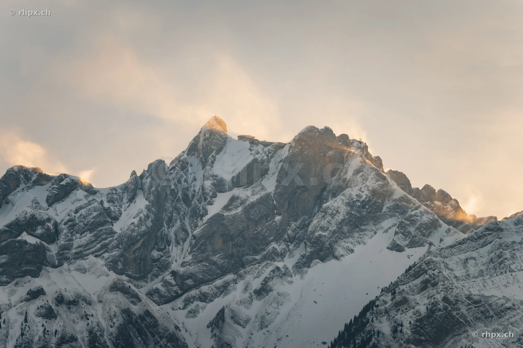 The snow-covered mountain range of Mount Pilatus near Lucerne in evening light