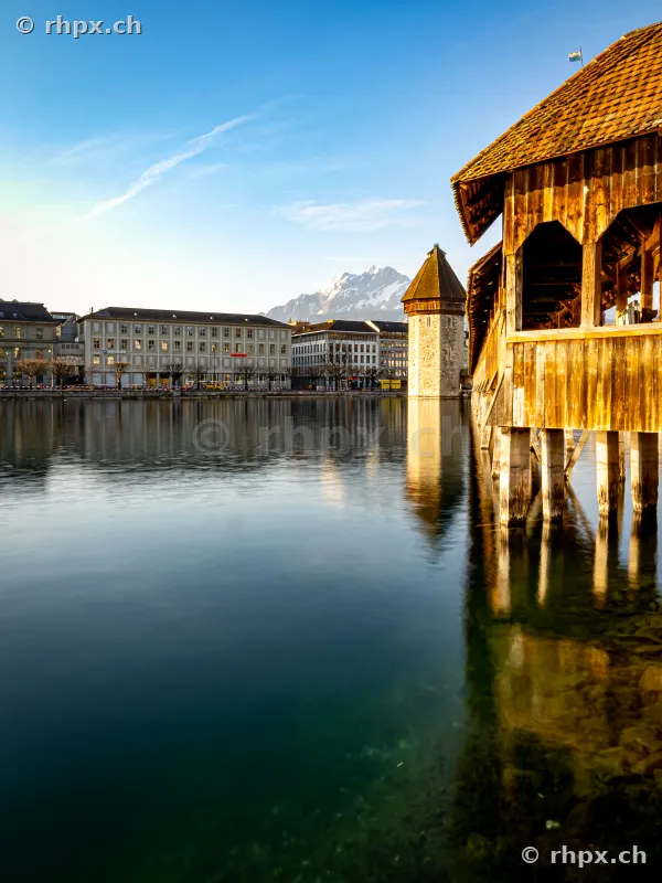 Chapel Bridge and Water Tower in Lucerne on the Reuss river during daylight
