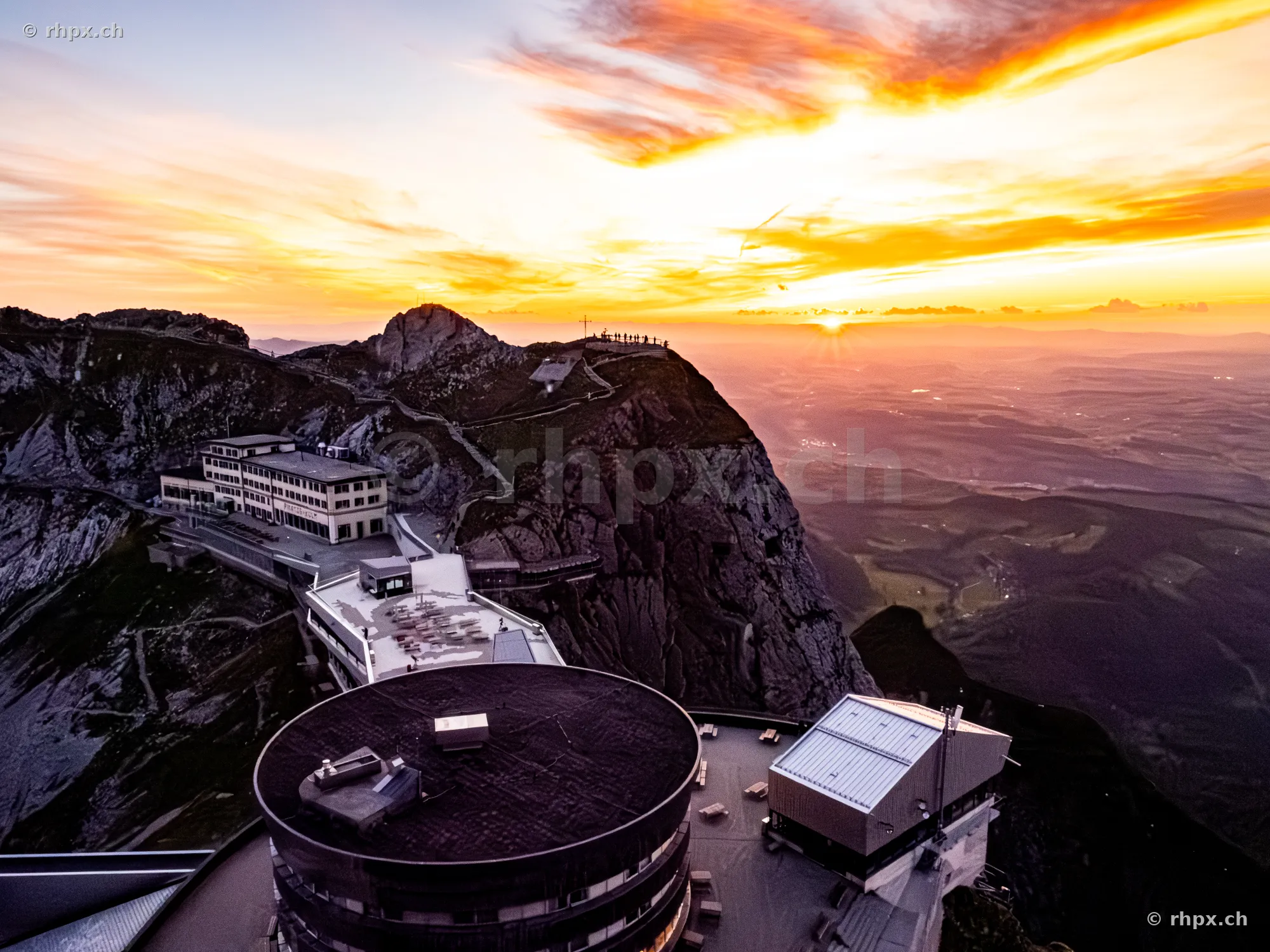 View of Hotel Pilatus-Kulm and the summit ridge at sunset