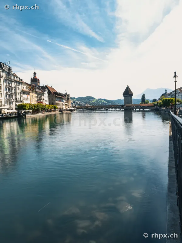 View of the Chapel Bridge and the Wasserturm in Lucerne across the Reuss river