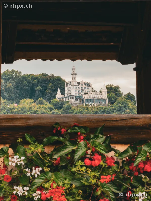 View from a window with flower box onto Château Gütsch in Lucerne