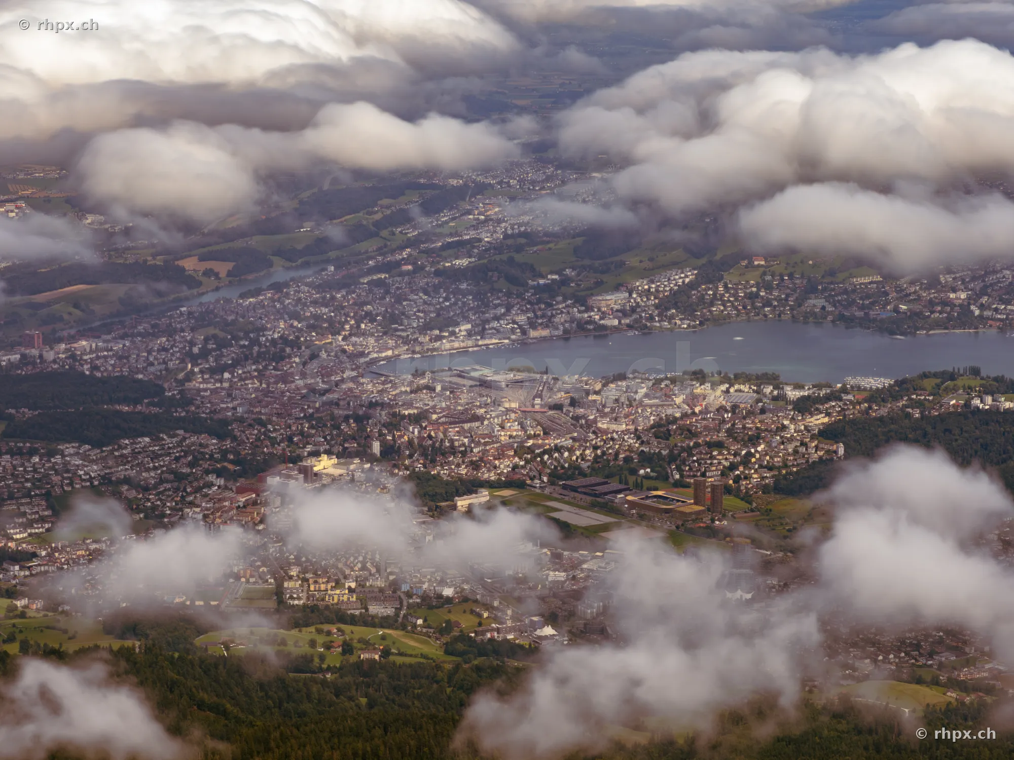 Aerial view of Lucerne city and Lake Lucerne under a cloudy sky