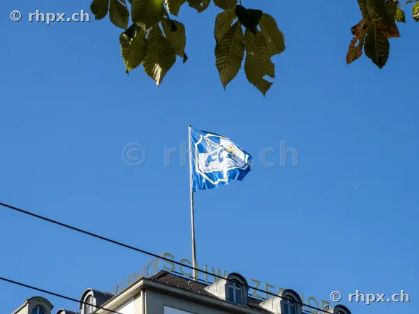 The 125th anniversary flag of FC Luzern flying on the roof of Hotel Schweizerhof in Lucerne.