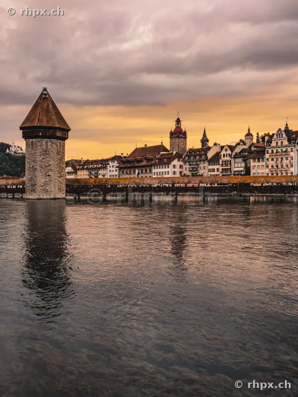 Water Tower and Chapel Bridge in Lucerne at dusk