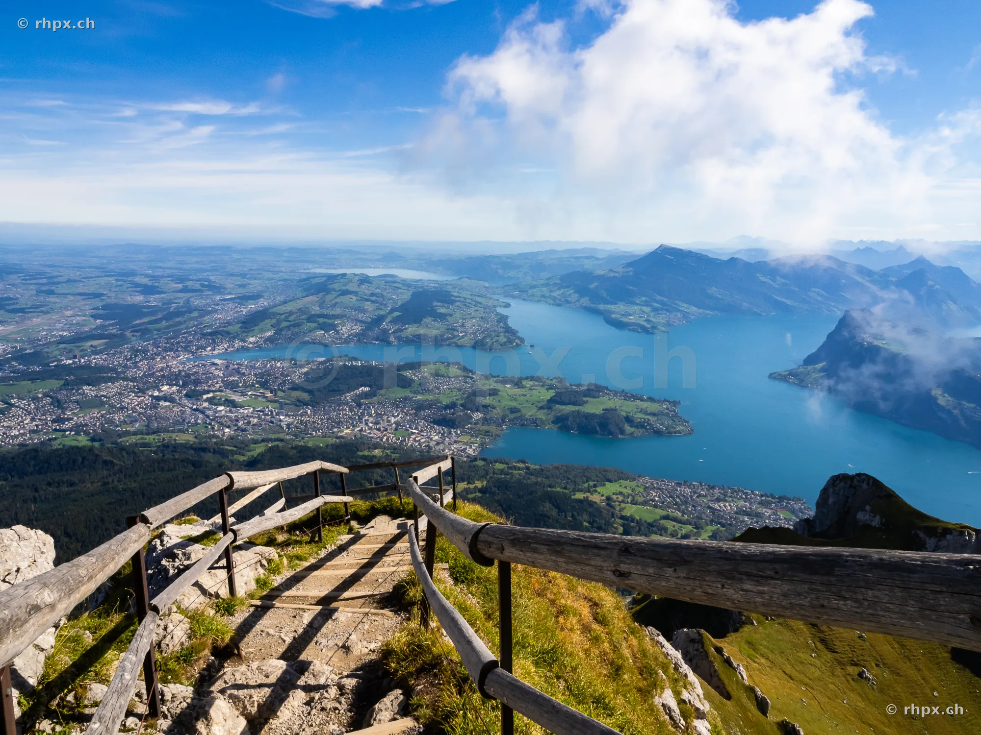 Hiking trail on Mount Pilatus with a view of Lake Lucerne and the surrounding area
