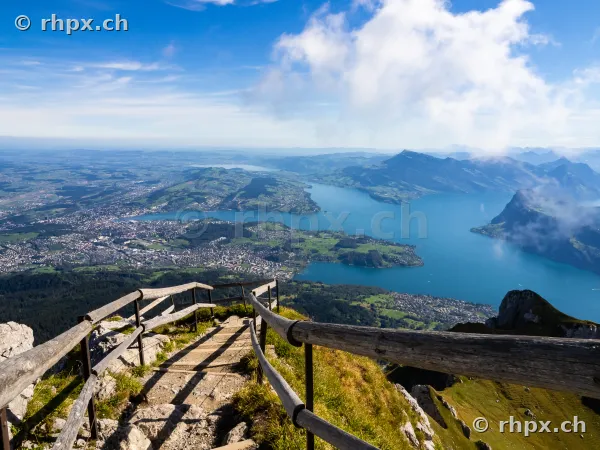 Hiking trail on Mount Pilatus with a view of Lake Lucerne and the surrounding area