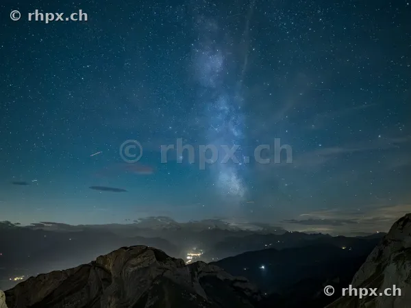 View of the Milky Way above the nocturnal ridge of Mount Pilatus