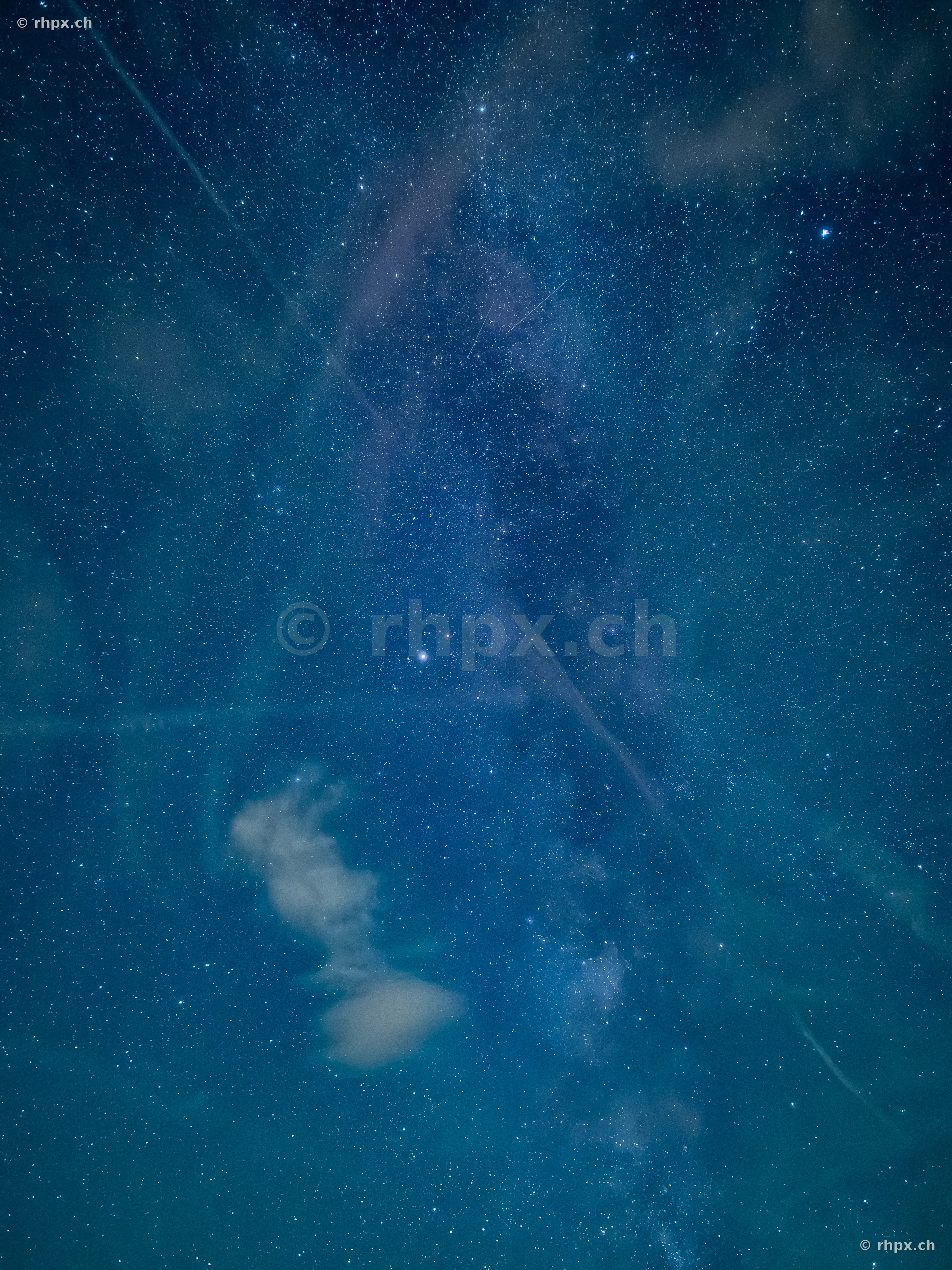 View into the night sky with the Milky Way over Mount Pilatus near Lucerne