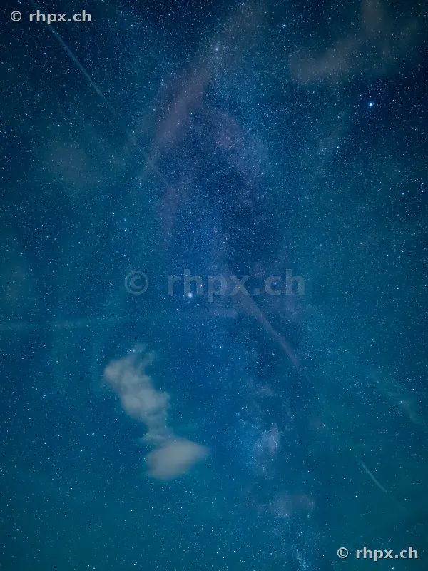 View into the night sky with the Milky Way over Mount Pilatus near Lucerne