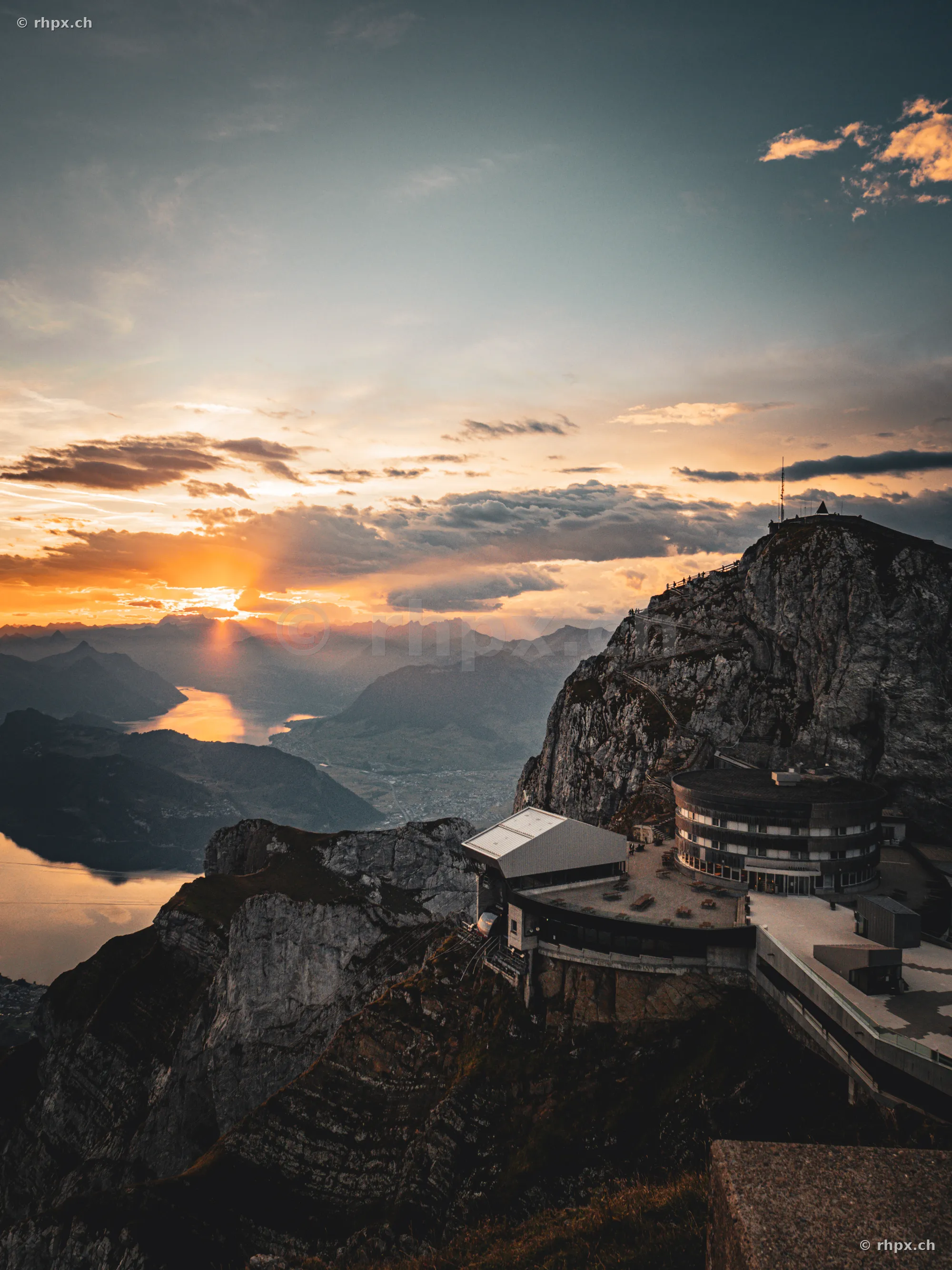 View of Mount Pilatus summit with Hotel Pilatus-Kulm at sunset