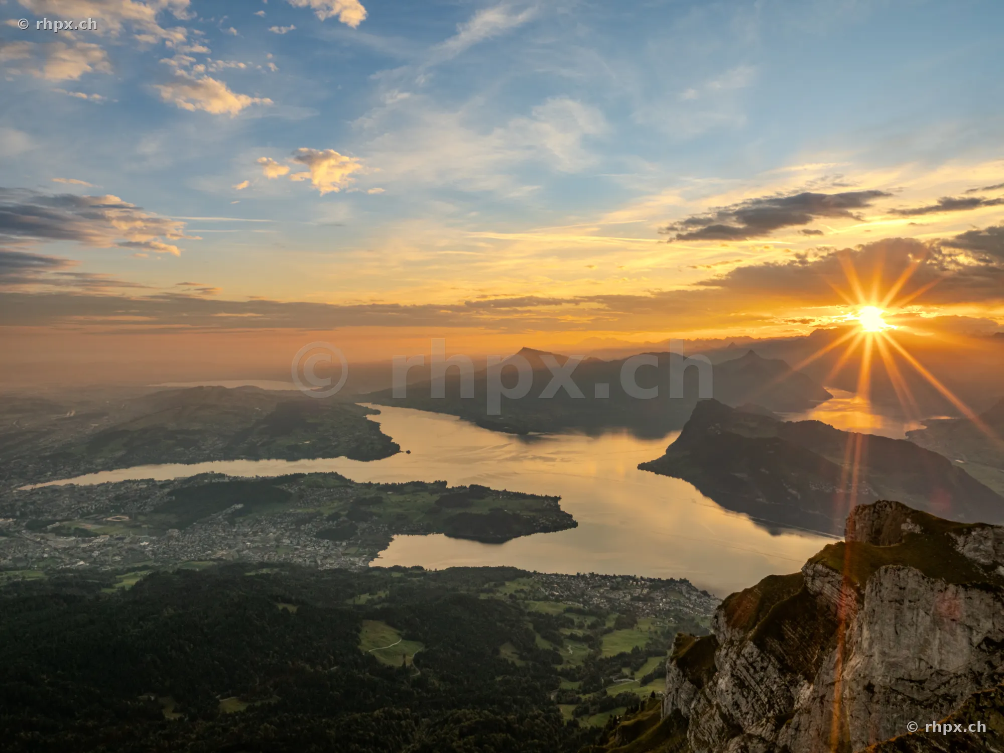 View from the peak of Mount Pilatus over Lake Lucerne at sunset