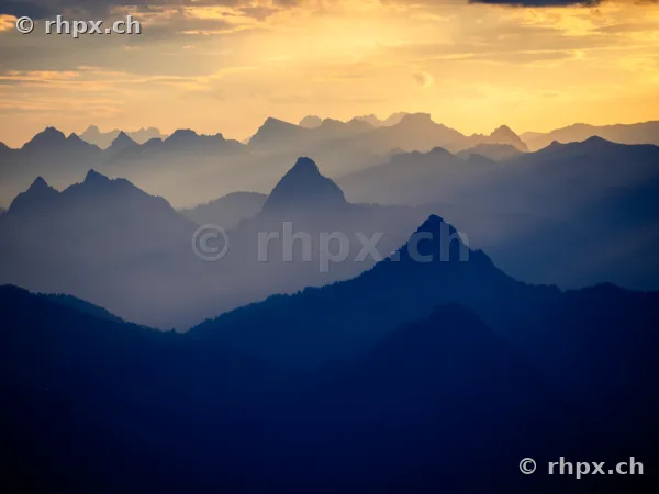 View of the Pilatus and Central Swiss mountain ranges at sunset
