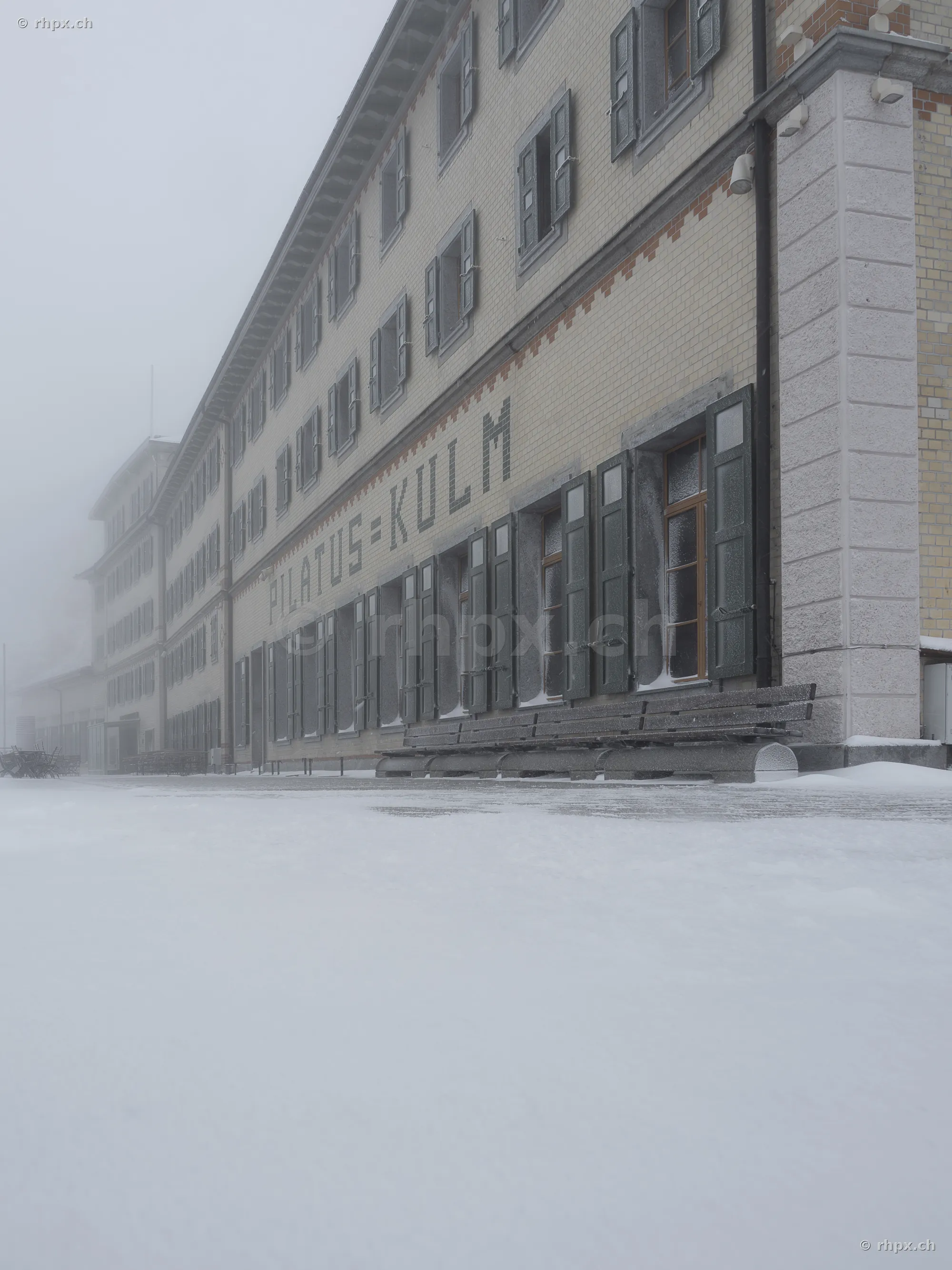Hotel Pilatus-Kulm in the snow-covered and foggy surroundings on the mountain
