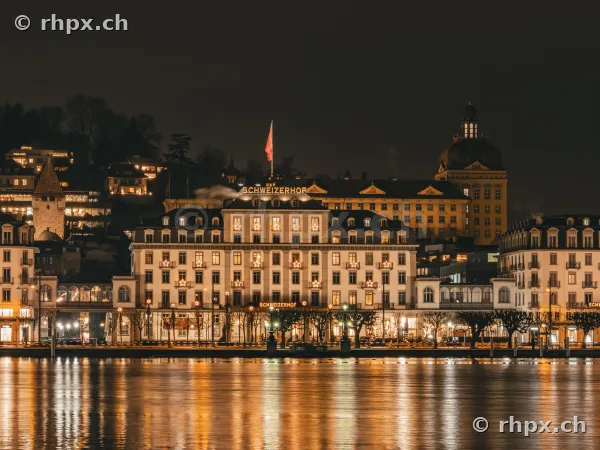 Hotel Schweizerhof at Lake Lucerne during Christmas time at night