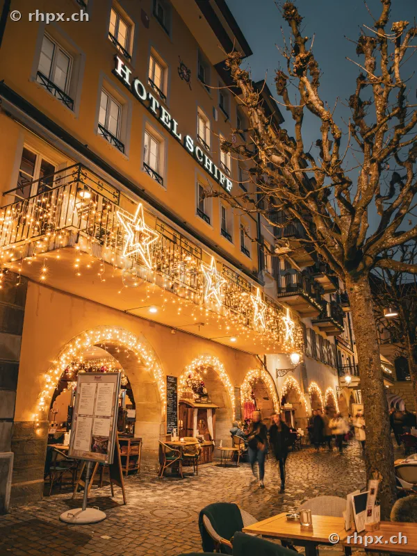 Hotel Schiff in the old town of Lucerne with Christmas facade lighting at twilight