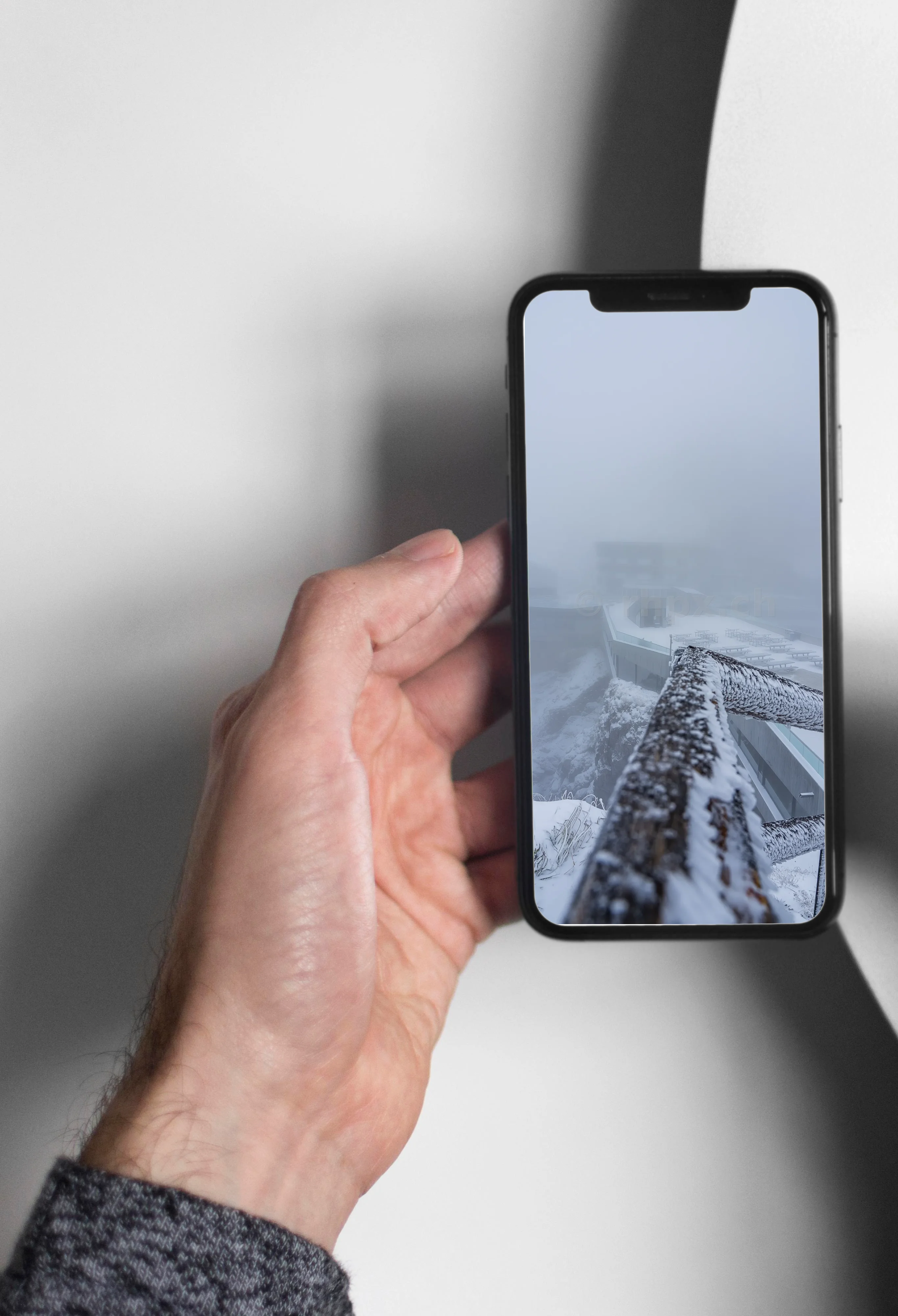 Snow-covered observation deck on Mount Pilatus in fog