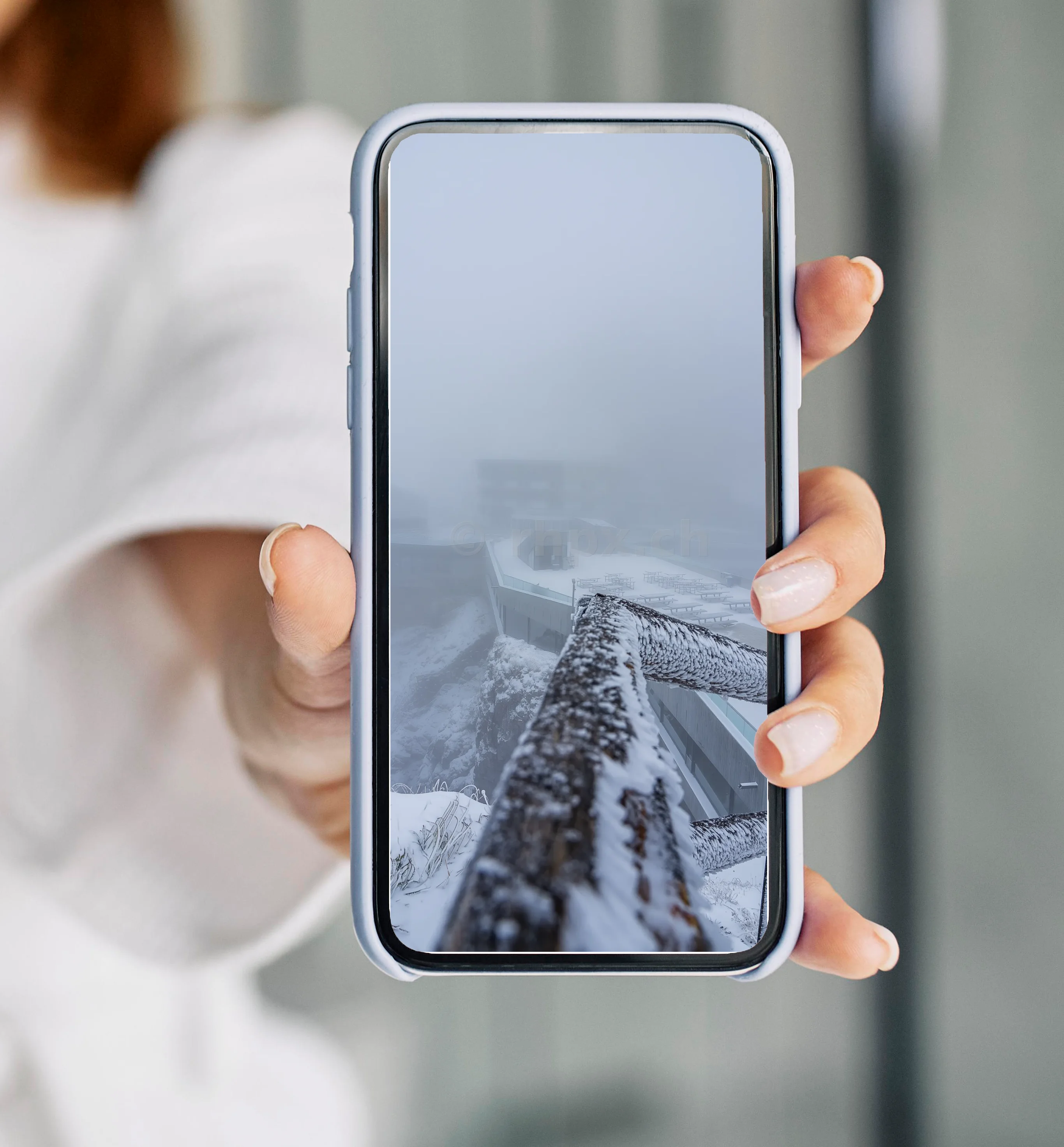 Snow-covered observation deck on Mount Pilatus in fog